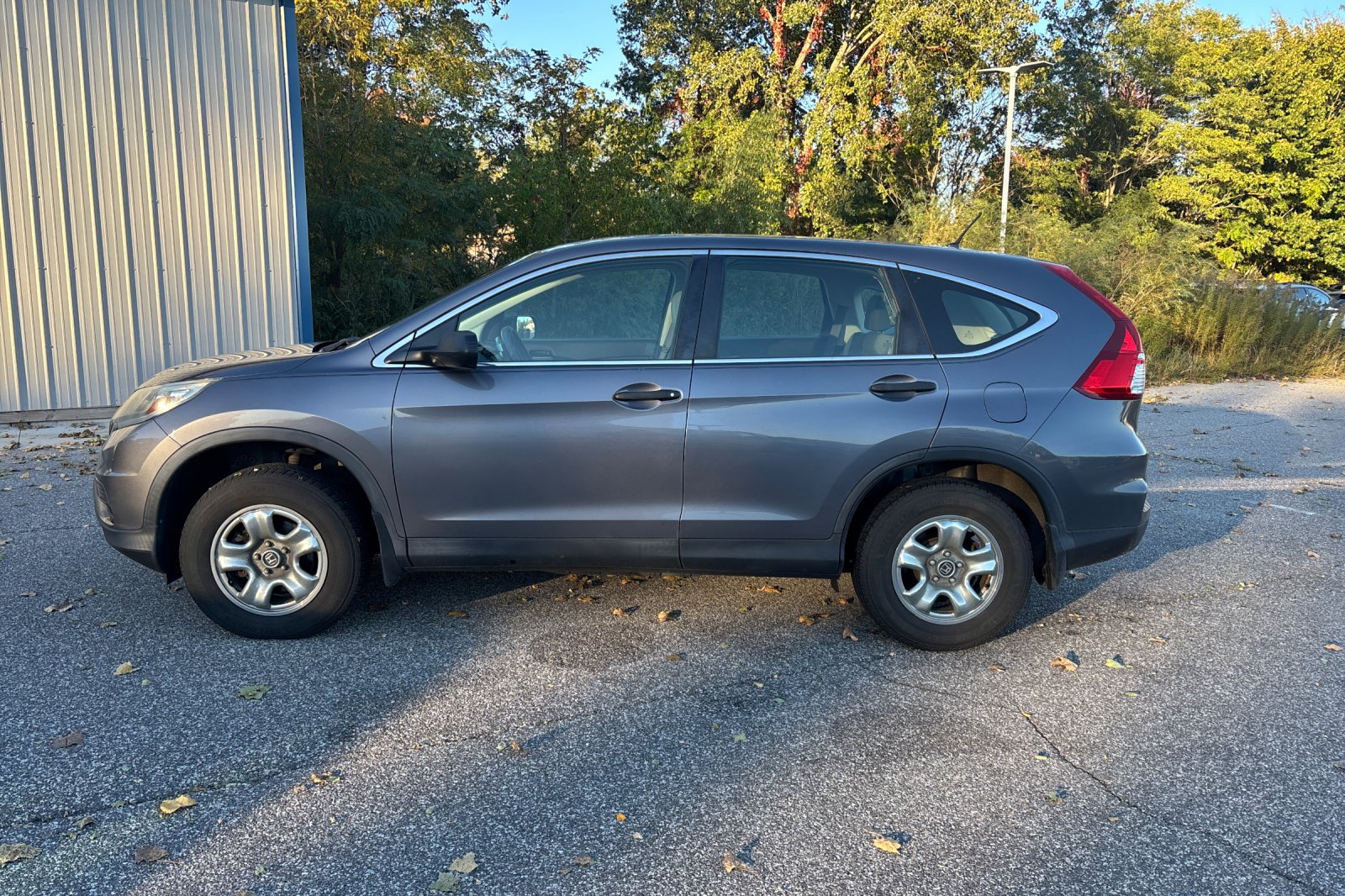 Used 2015 Honda CR-V LX with VIN 5J6RM4H34FL088361 for sale in Michigan City, IN
