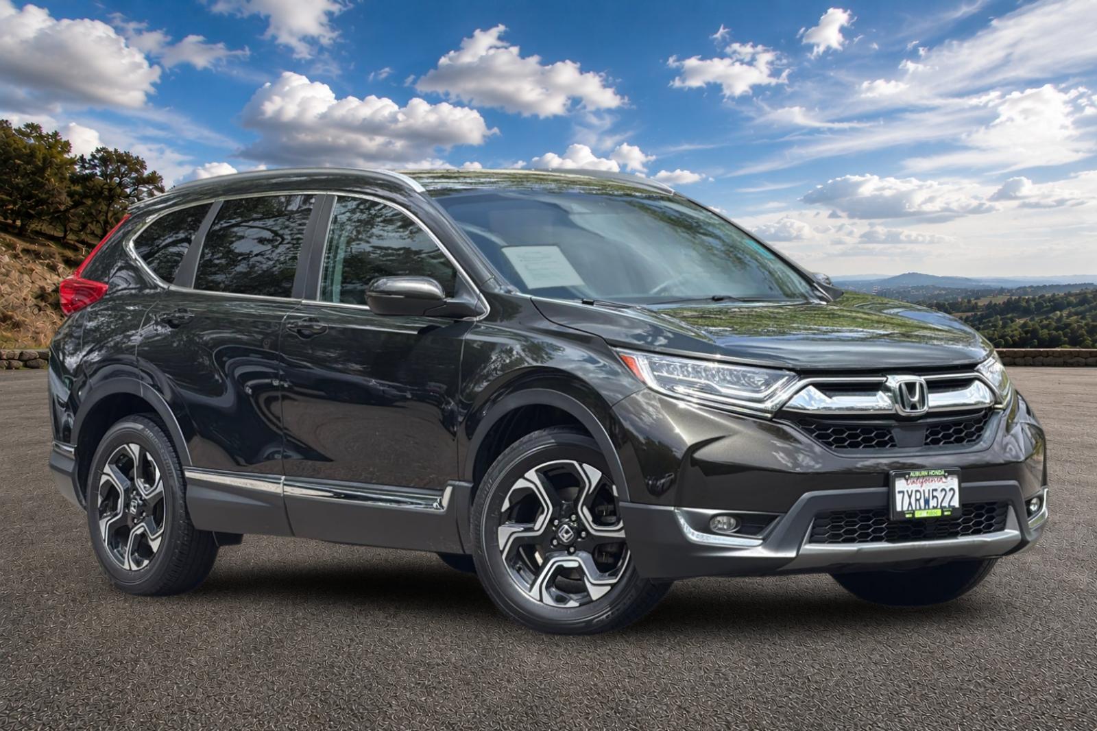 Used 2017 Honda CR-V Touring with VIN 5J6RW2H95HL015814 for sale in Auburn, CA