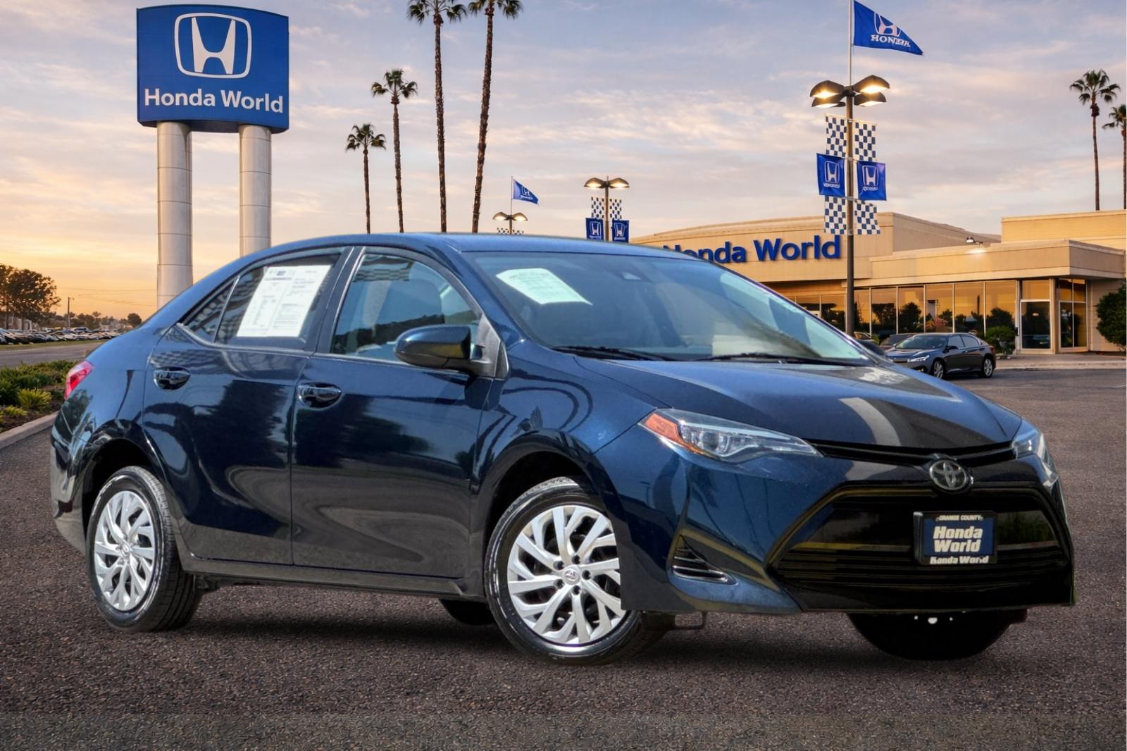 Used 2018 Toyota Corolla LE with VIN 5YFBURHE0JP769297 for sale in Westminster, CA