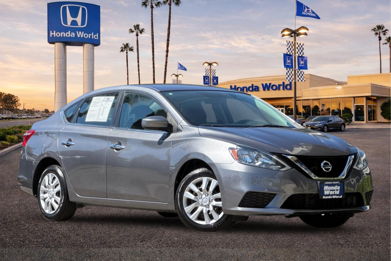 Used 2019 Gun Metallic Nissan S image 2