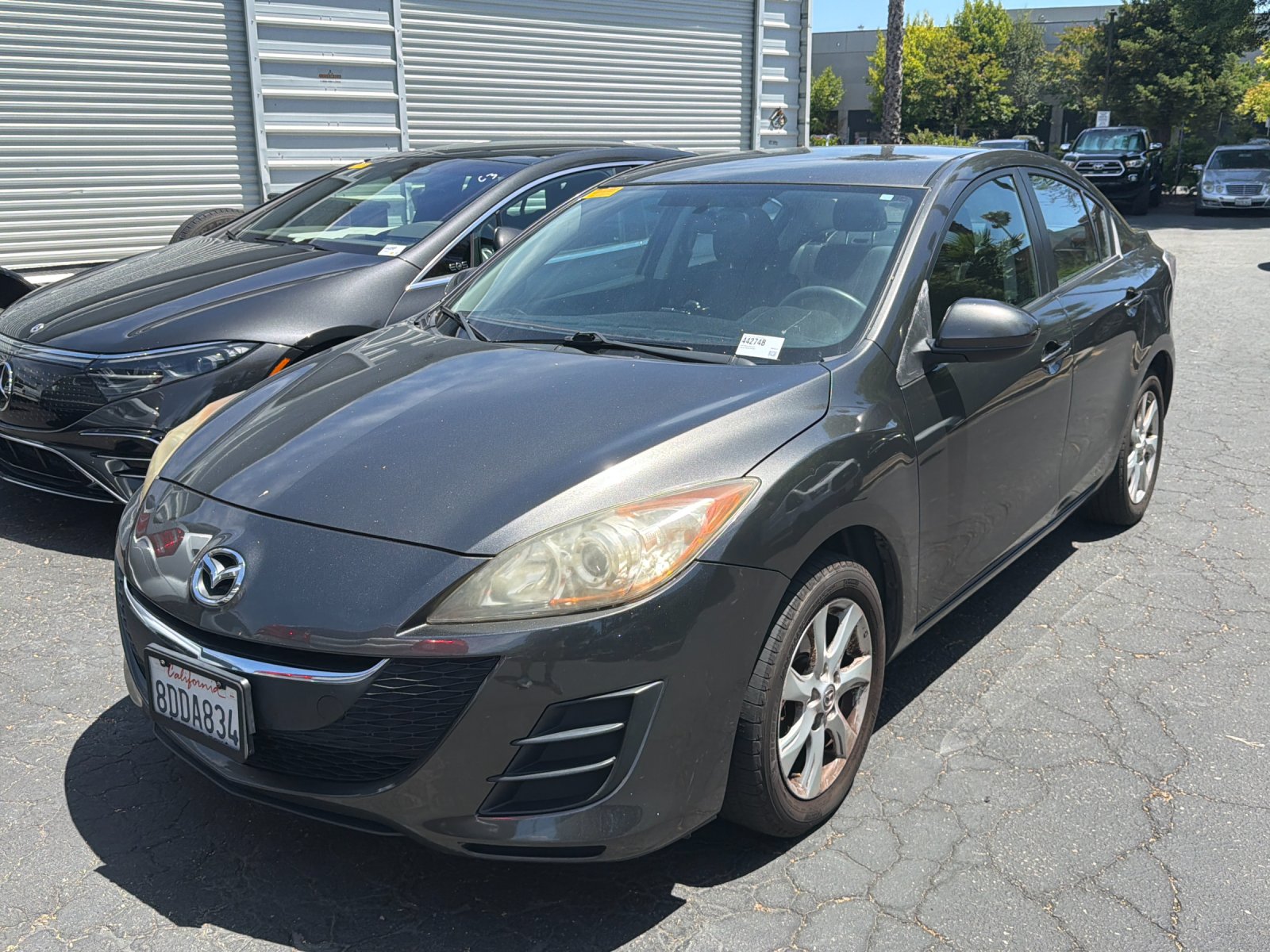 Used 2010 Graphite Mazda i Touring 4D Sedan image 2