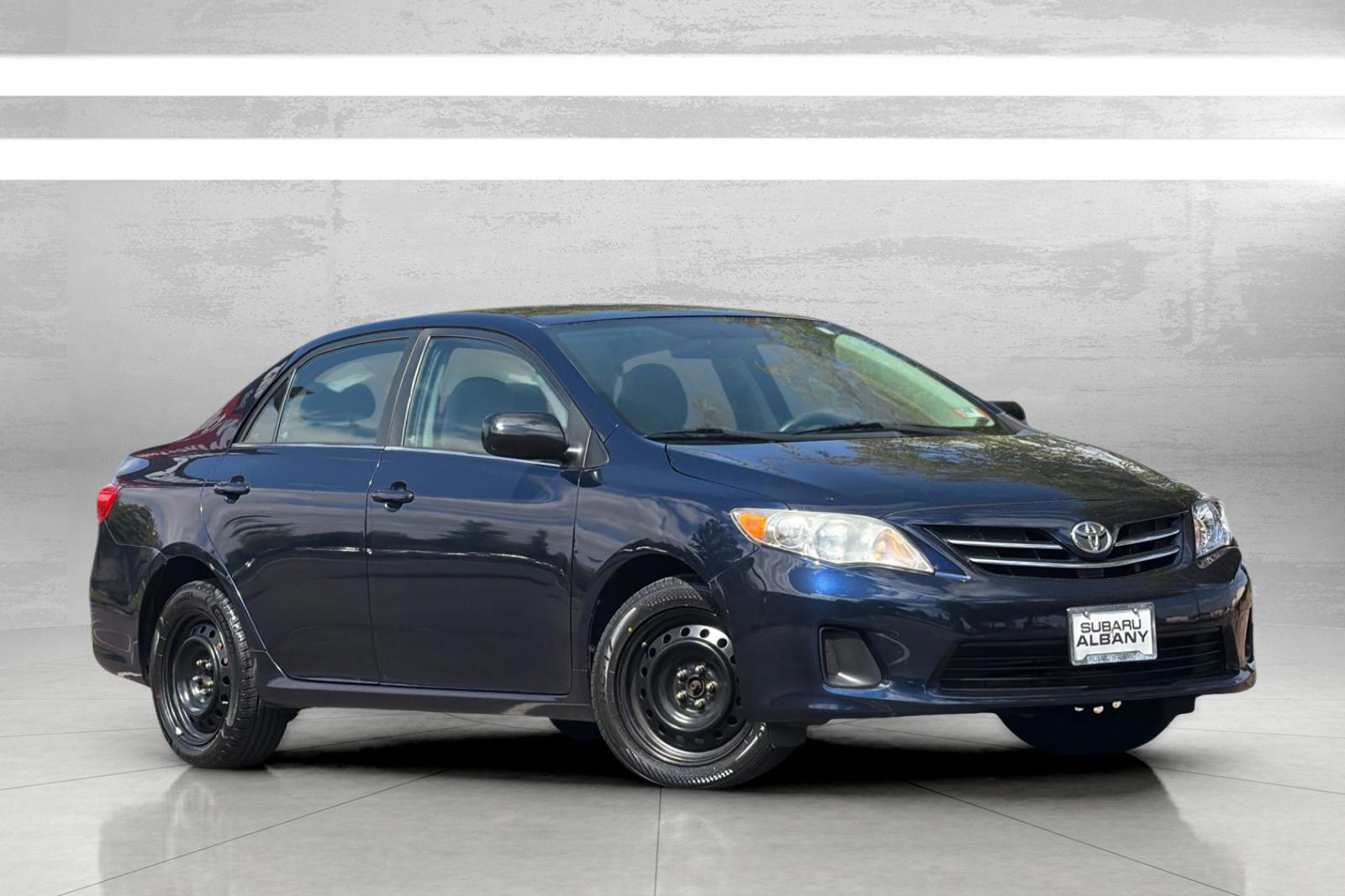 Used 2013 Blue Toyota LE image 2