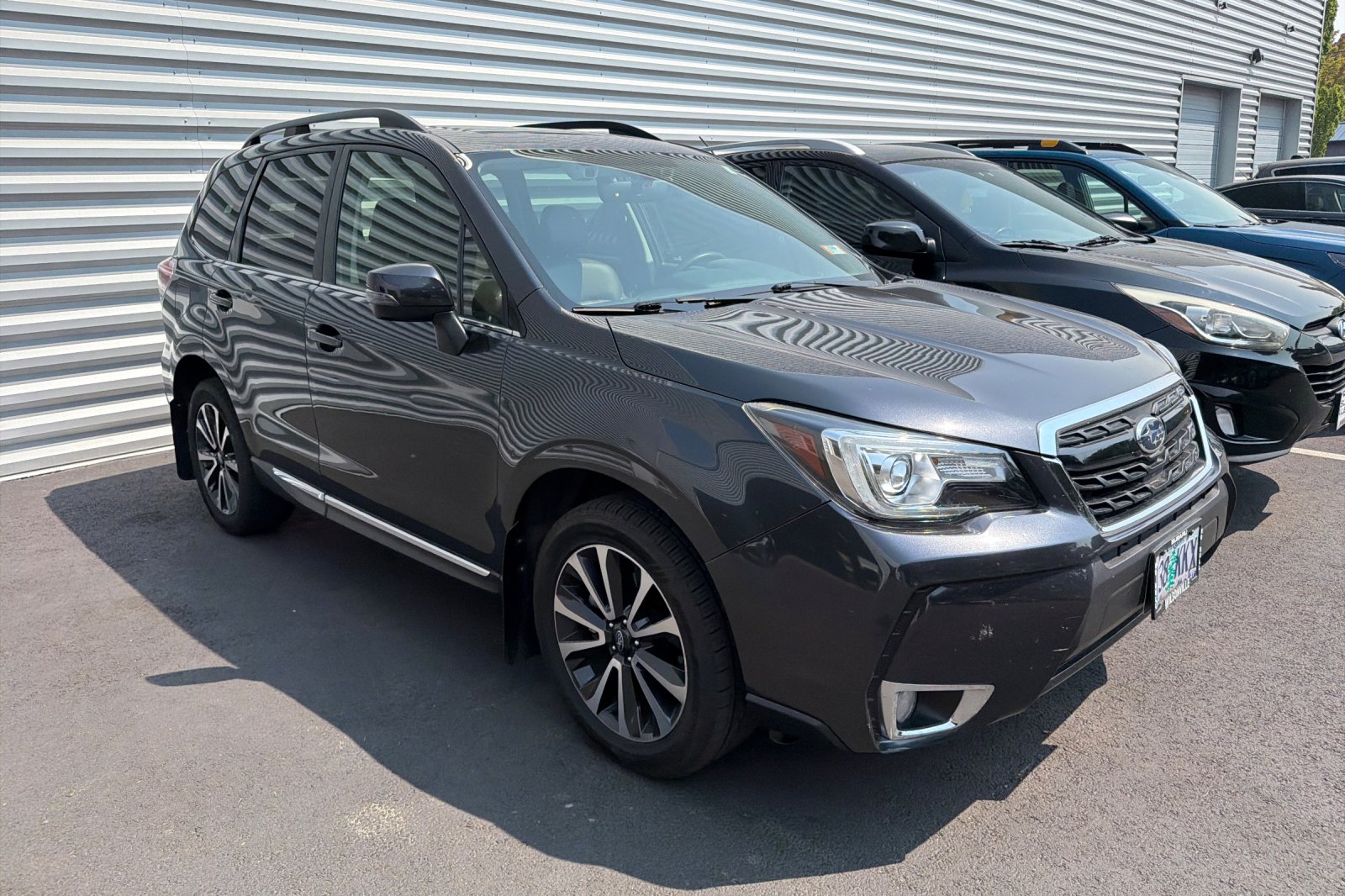 Used 2018 Dark Gray Metallic Subaru Touring image 2