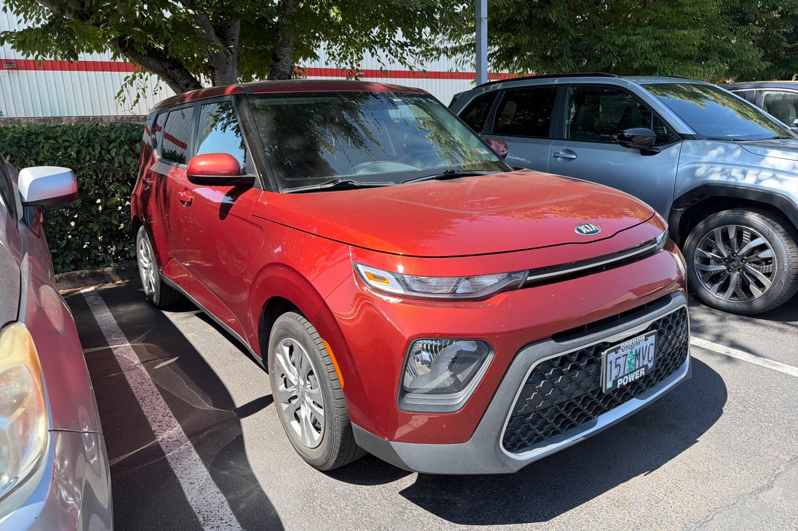 Used 2021 Orange Kia LX image 2