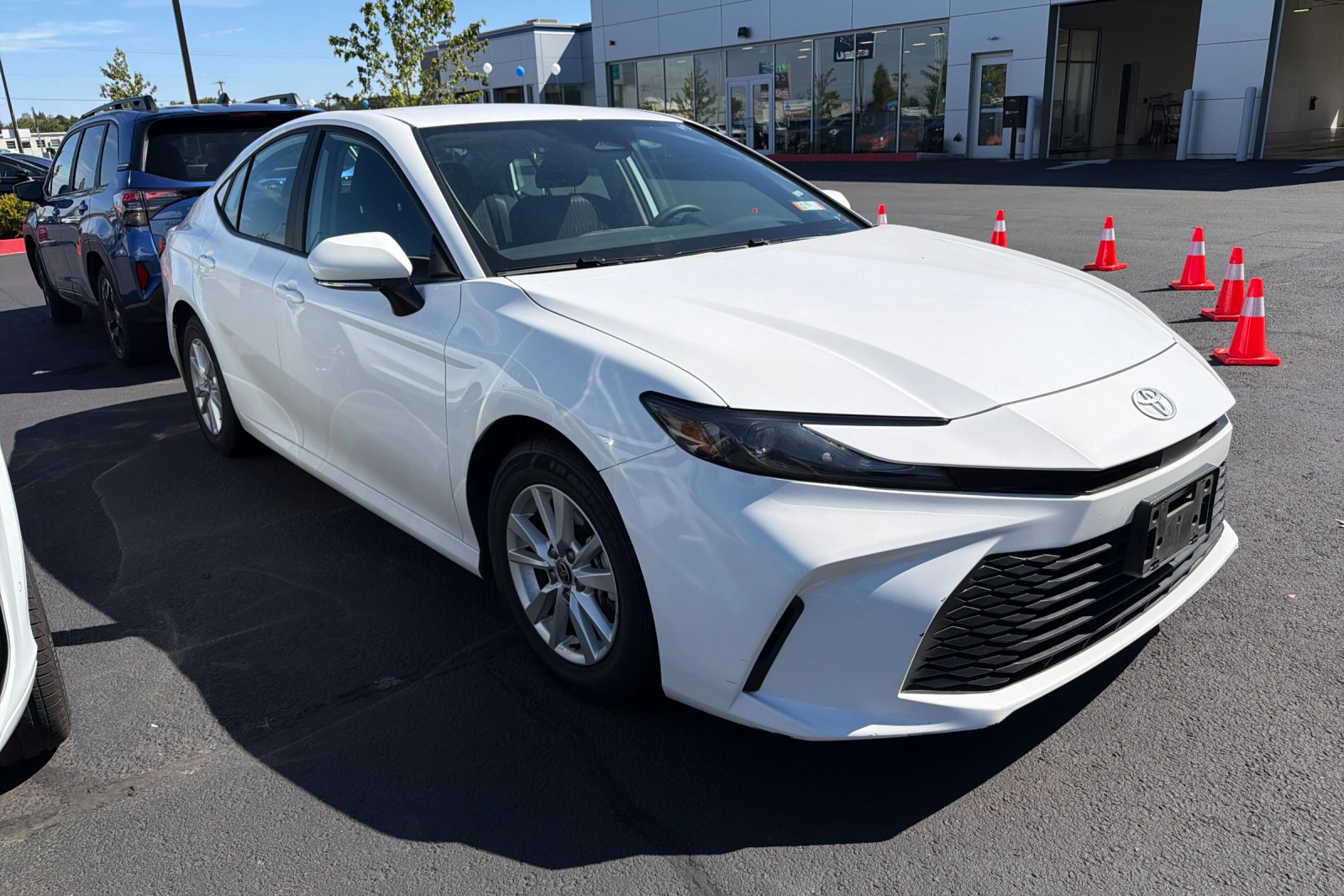 Used 2025 White Toyota LE image 2
