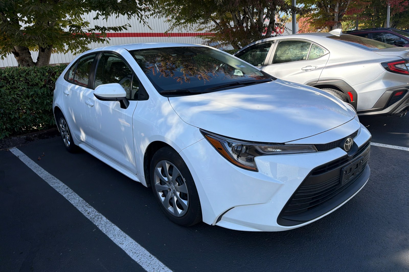 Used 2025 White Toyota LE image 2