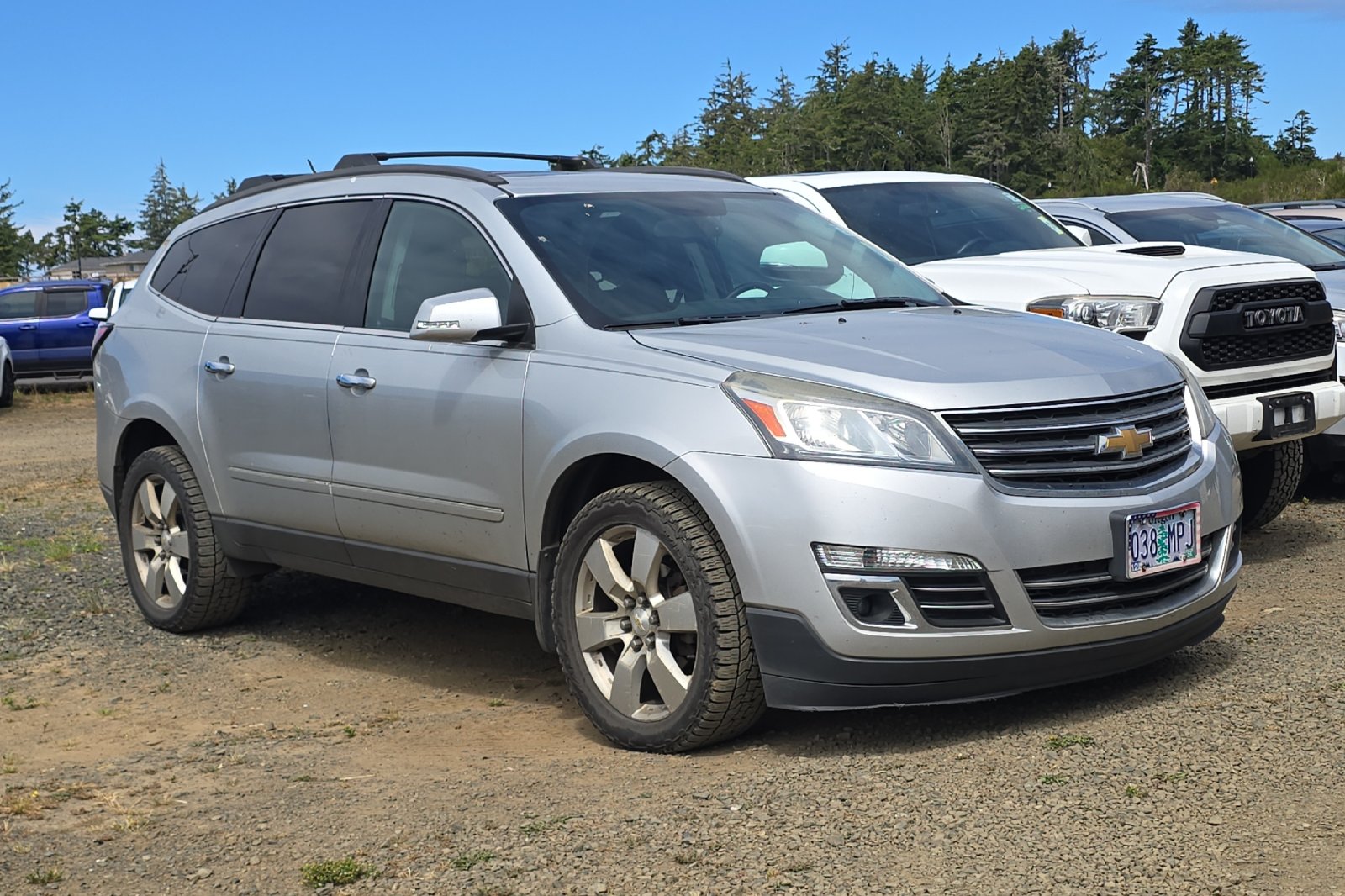 Used 2013 Chevrolet Traverse LTZ with VIN 1GNKVLKD3DJ266387 for sale in Newport, OR