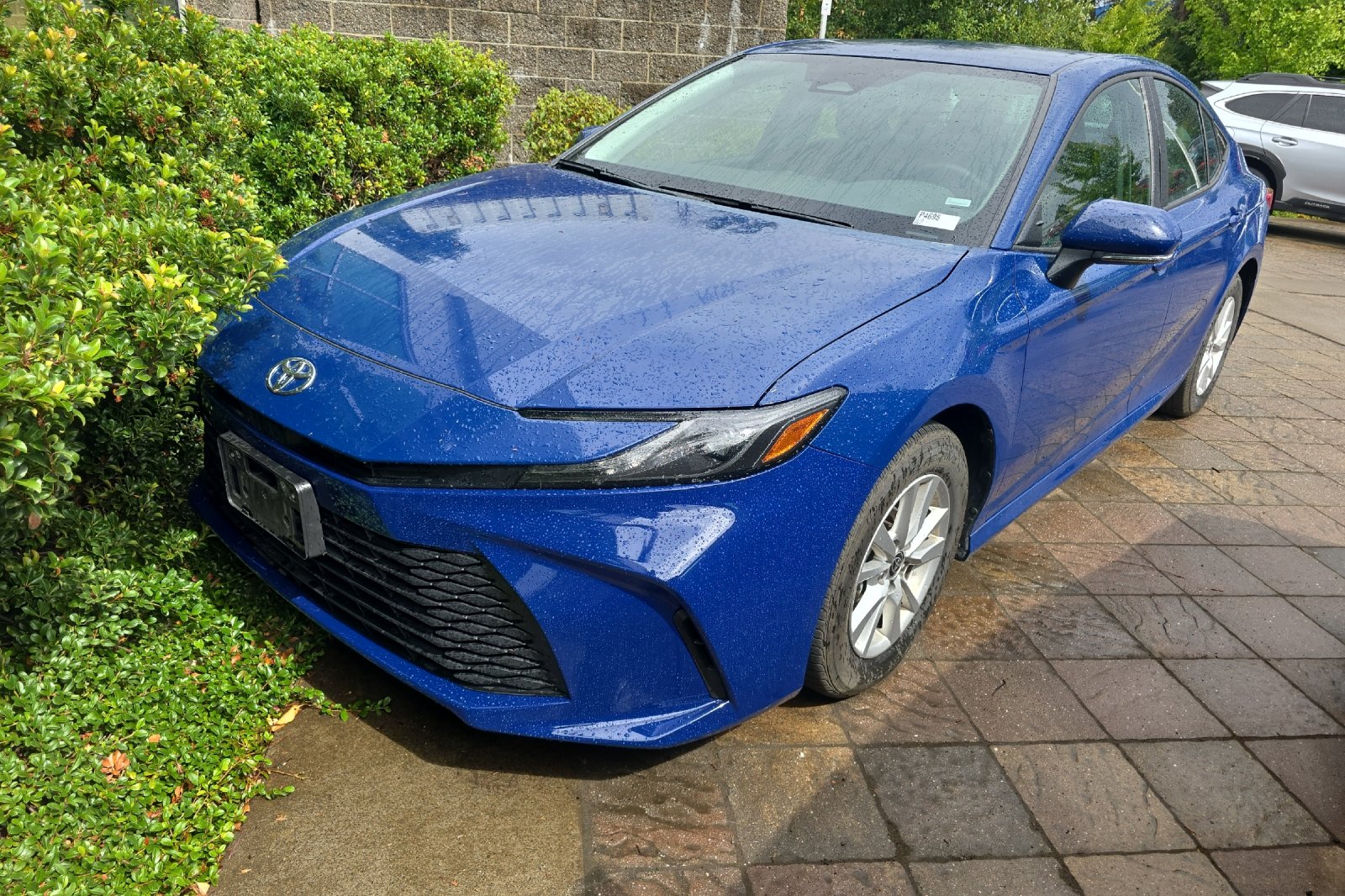 Used 2025 Reservoir Blue Toyota LE image 2